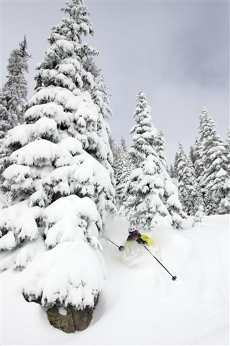 This October 2011 photo courtesy of Wolf Creek Ski Area shows a skier on the slopes at Wolf Creek Ski Area, Mineral County, Colo. An autumn storm that dumped 3 feet of snow at Wolf Creek let the ski area open for weekend skiing Oct. 8 _ its earliest opening ever. (AP Photo/Wolf Creek Ski Area)